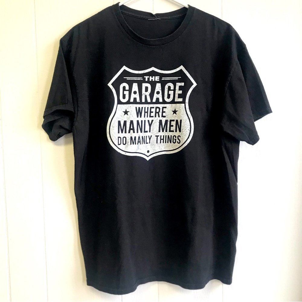 Father’s Day Tee. “The Garage. Where Manly Men Do Manly Things”.
